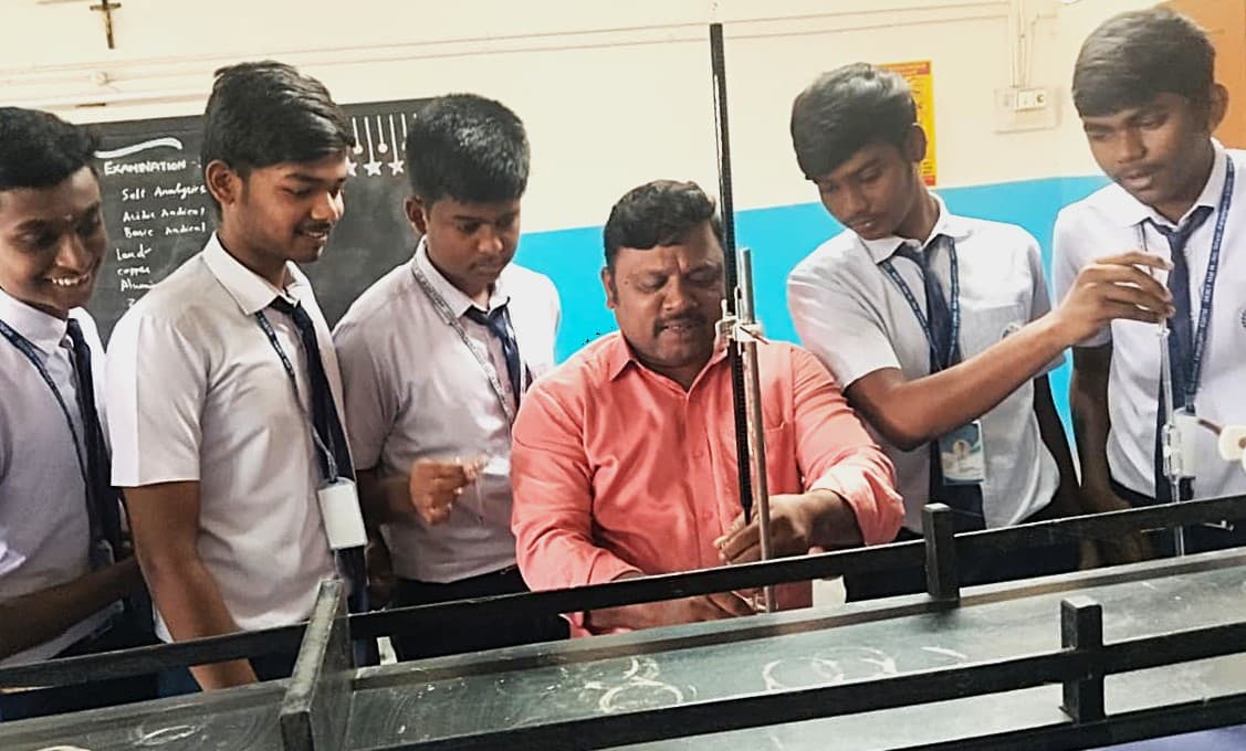 Student Doing Chemistry Experiment